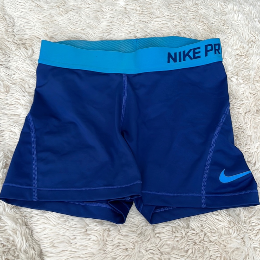 Blue Nike pro shorts